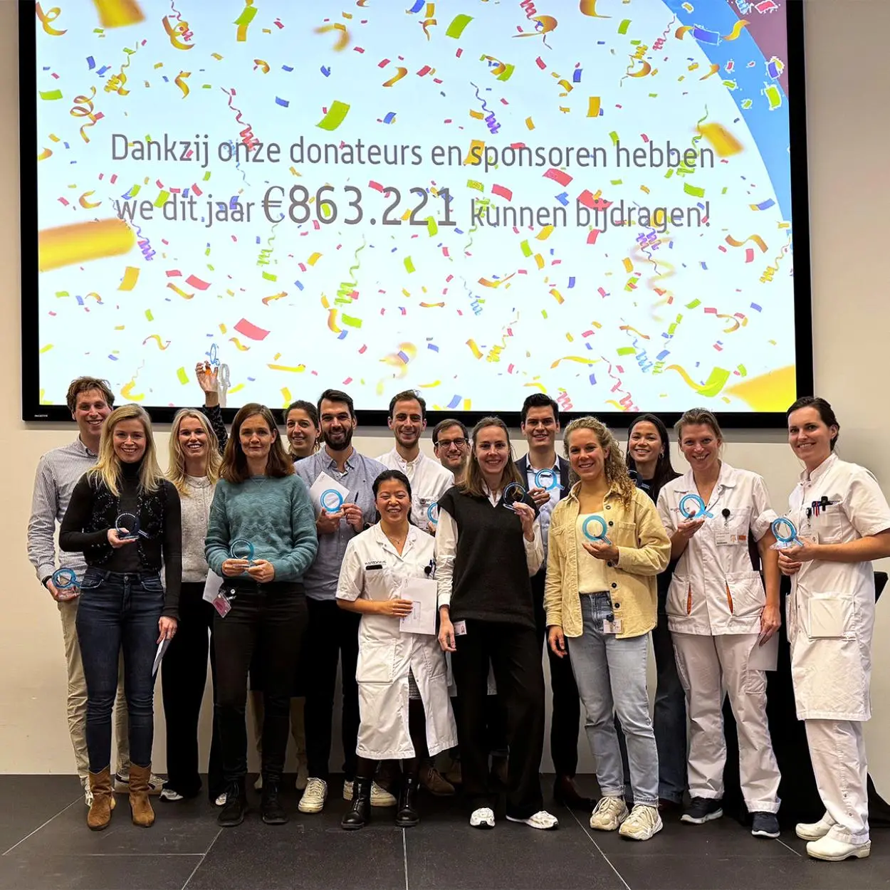 Onderzoekers op het podium